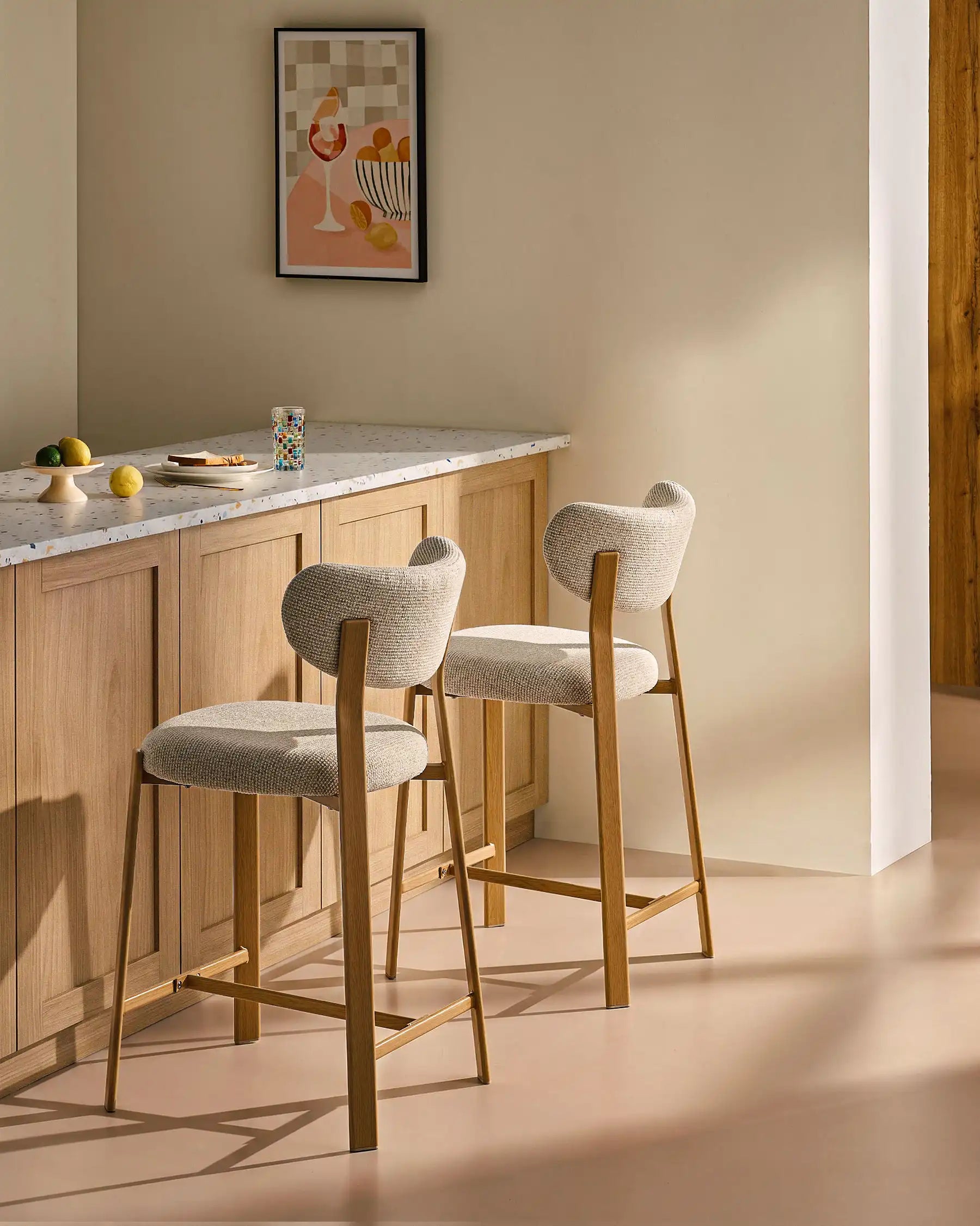 Bramley beige chenille bar stools in a modern dining space