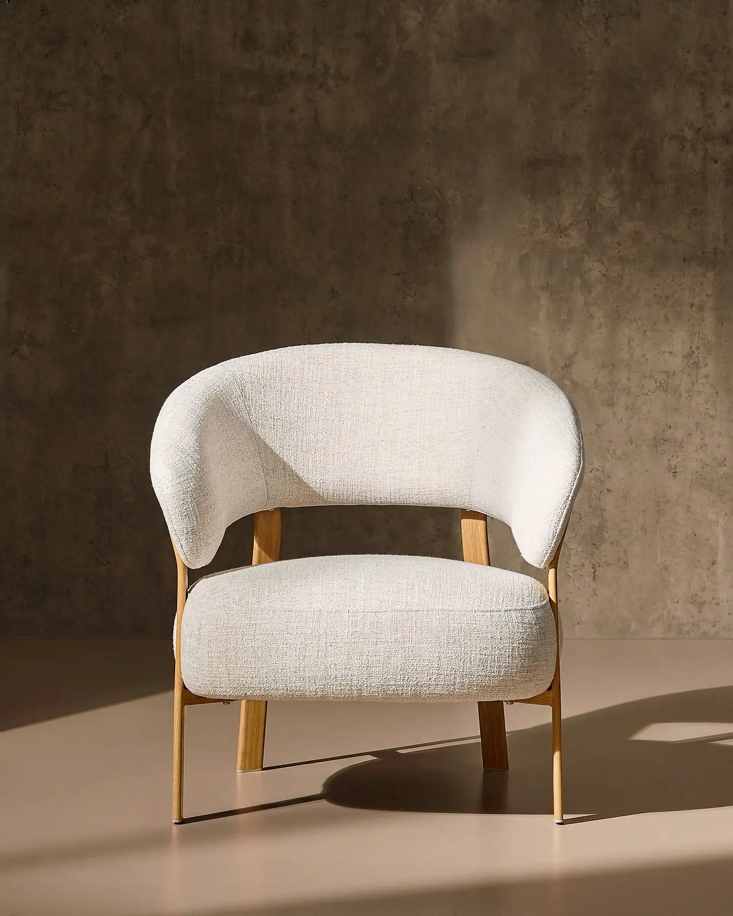 Bramley cream linen blend accent chair in a modern living space