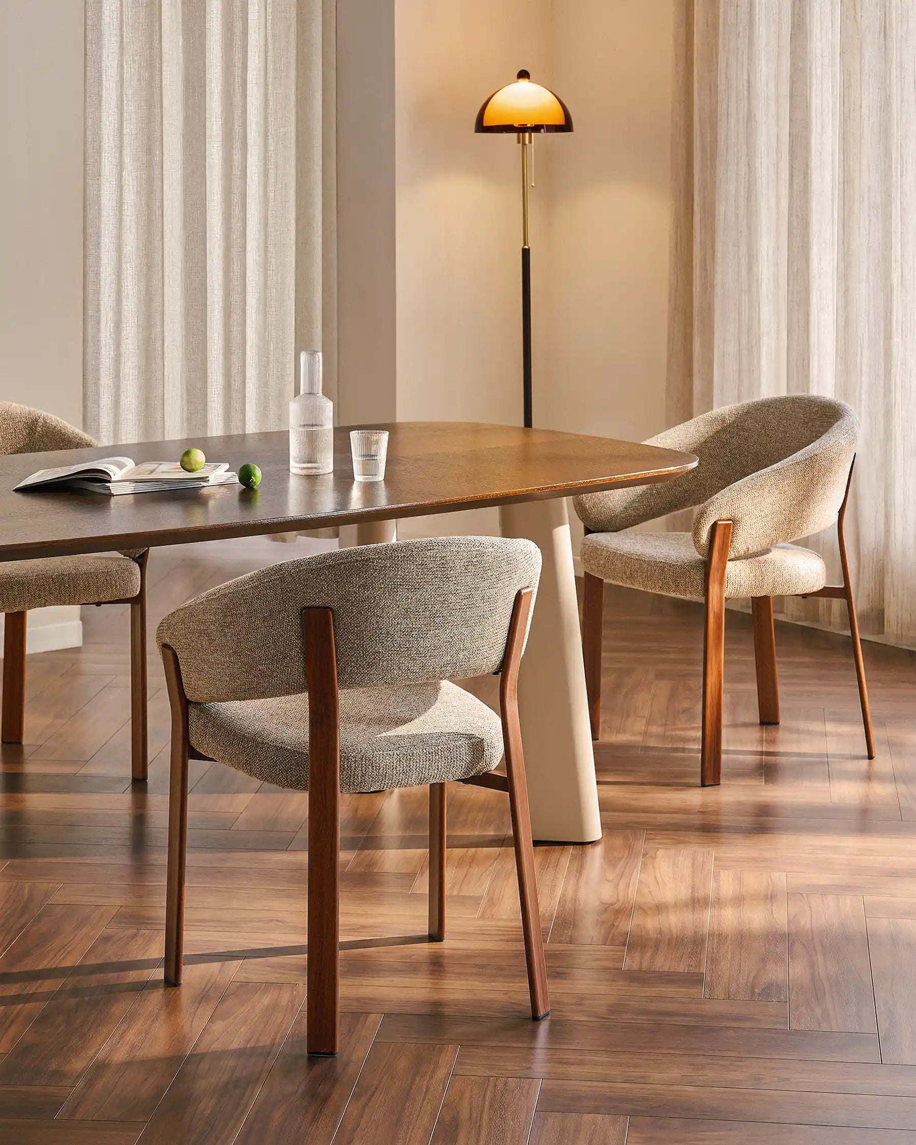 Bramley taupe chenille dining armchair in a modern dining space