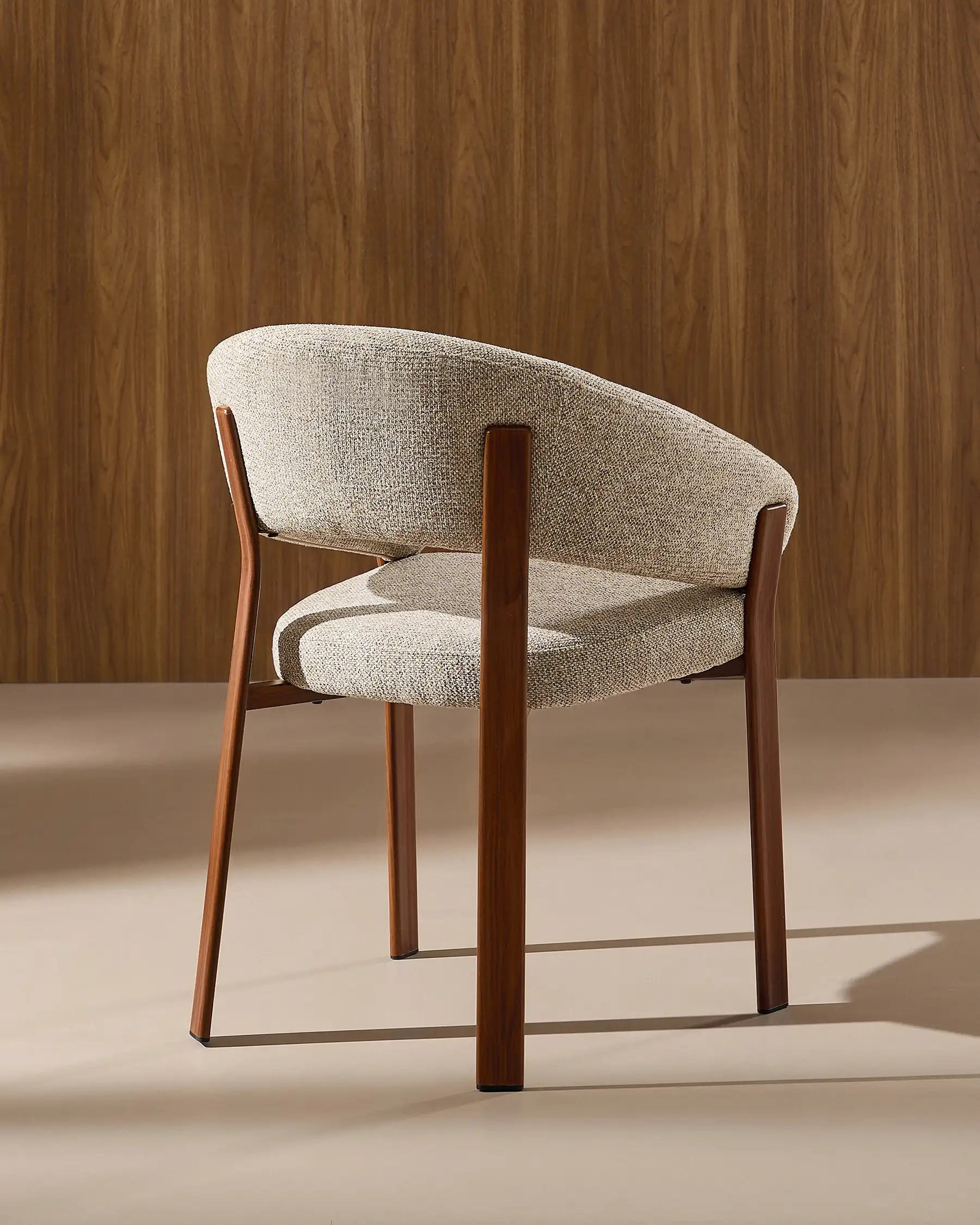 Side view of Bramley taupe chenille dining armchair
