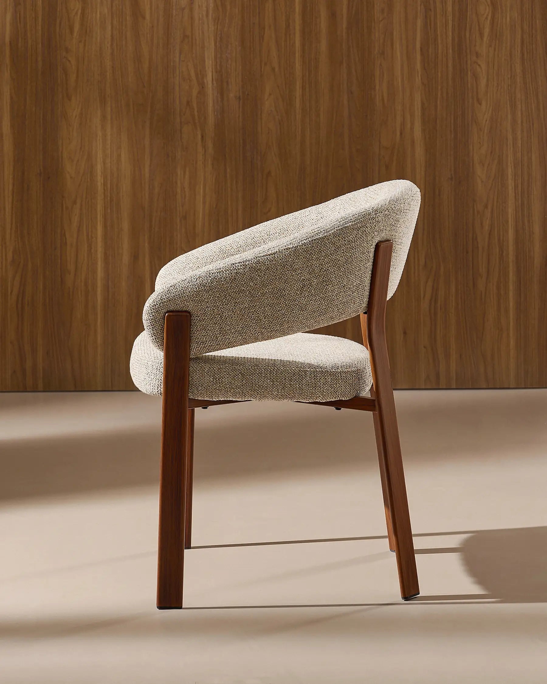 Side view of Bramley taupe chenille dining armchair