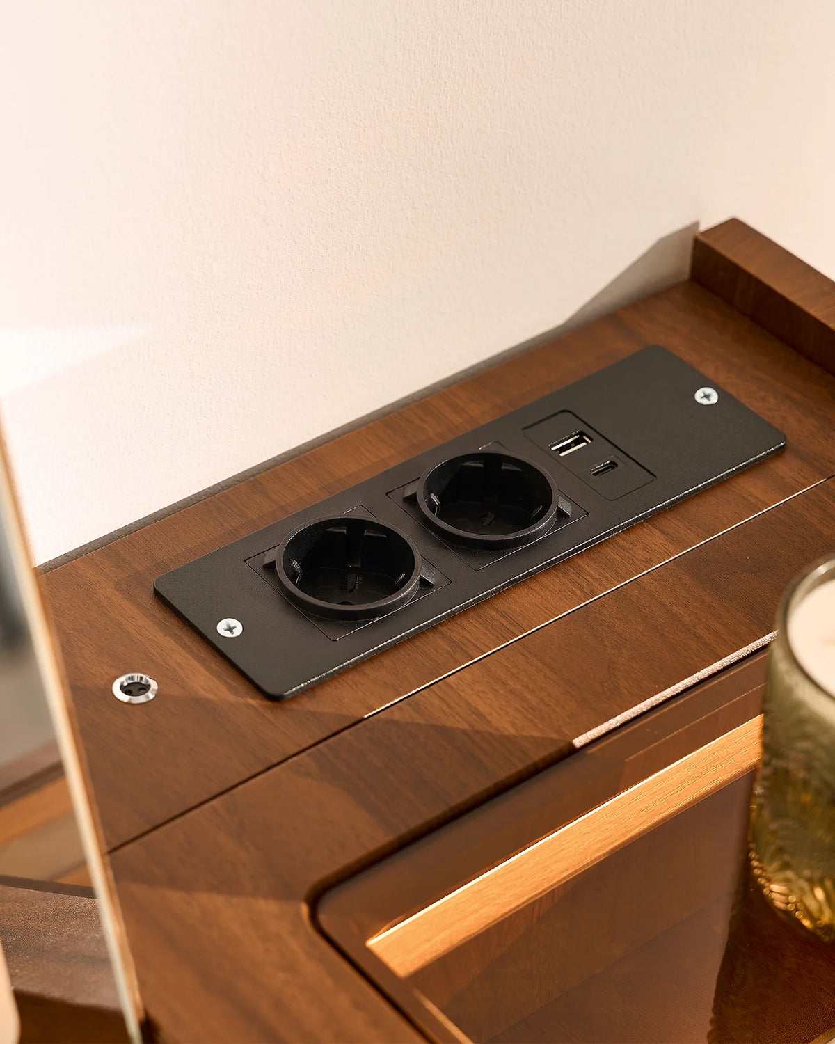 Integrated EU power sockets on the Elora dressing table for convenient access to power