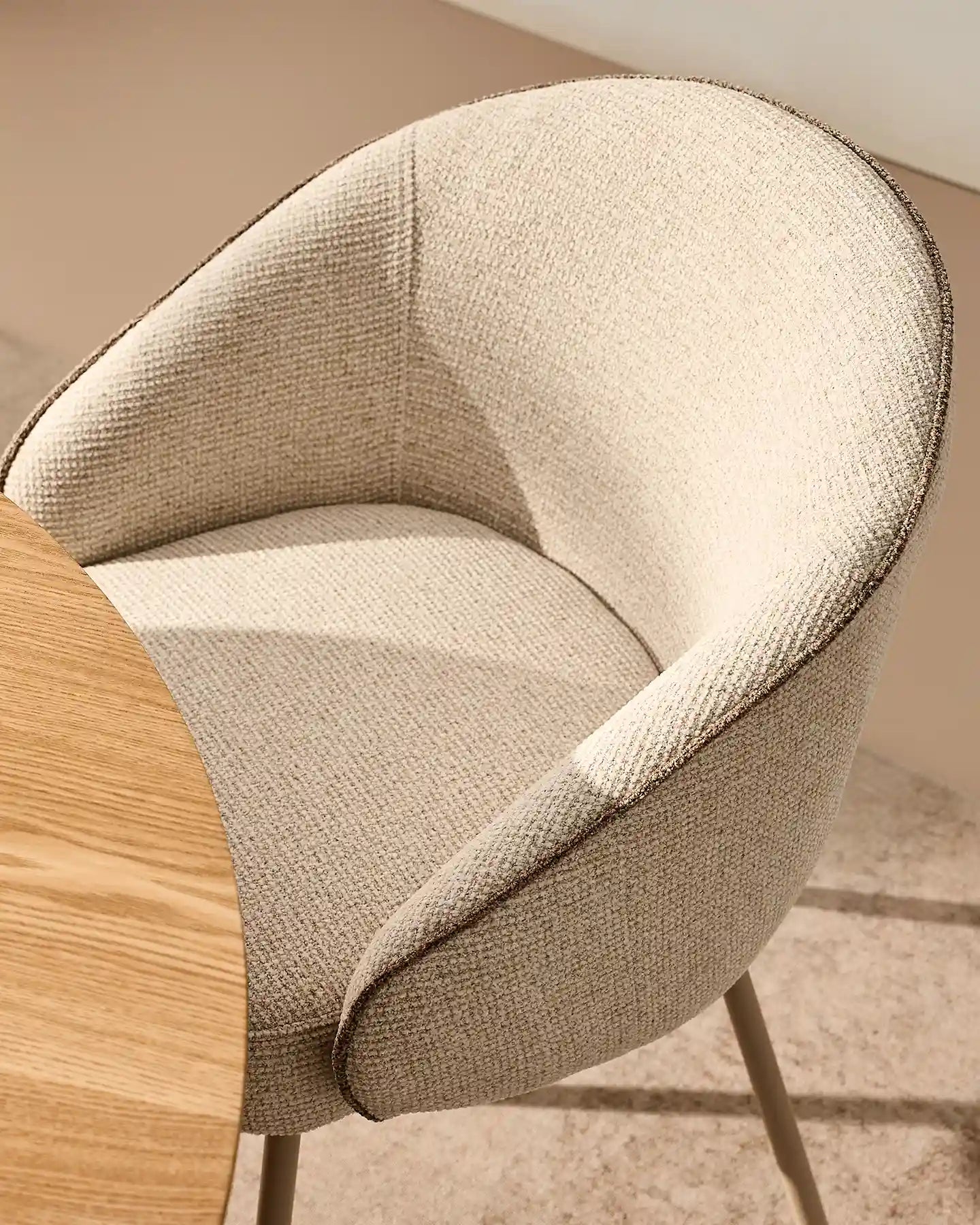 Close-up of Elowen beige chenille dining chair details