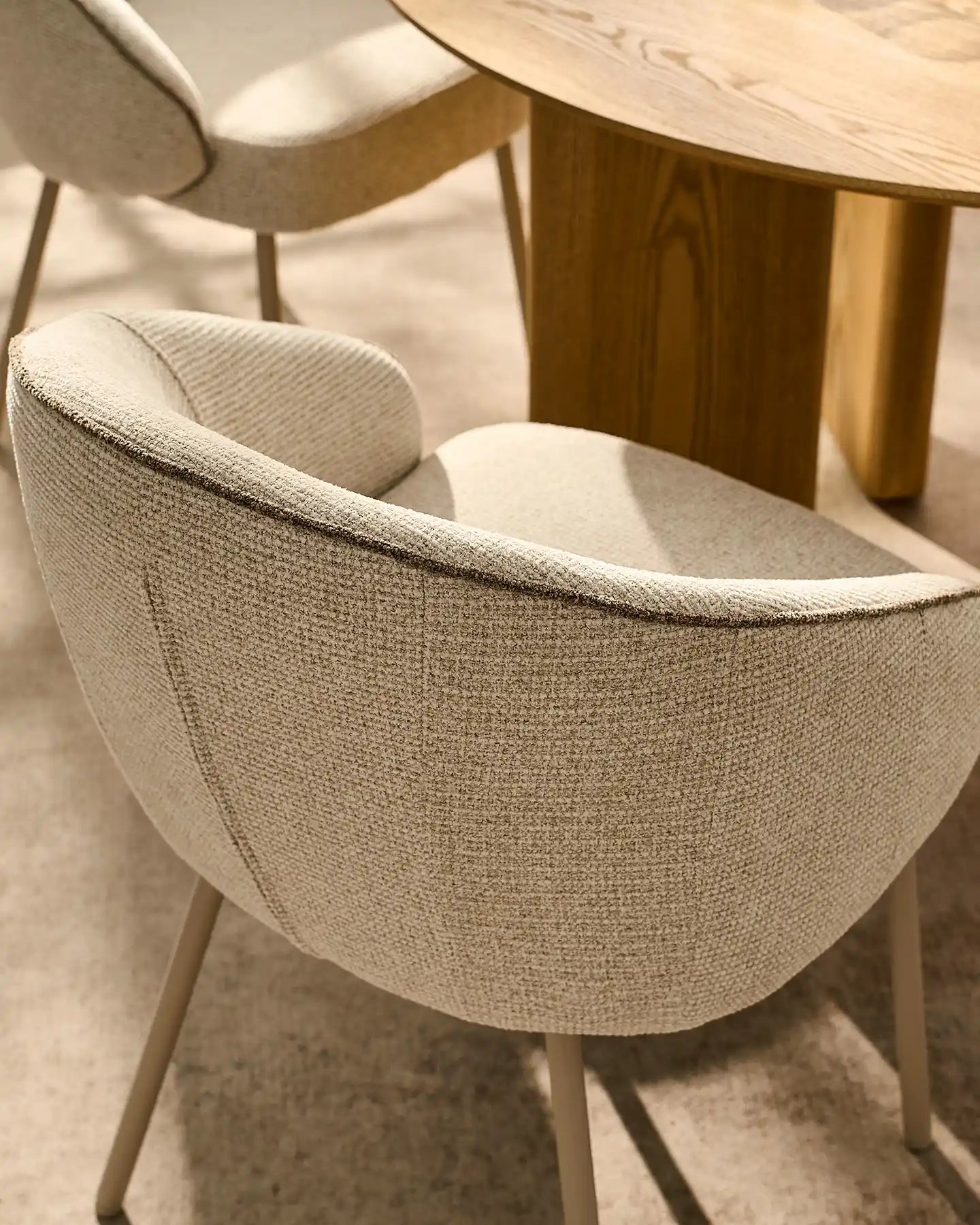 Close-up of Elowen beige chenille dining chair details