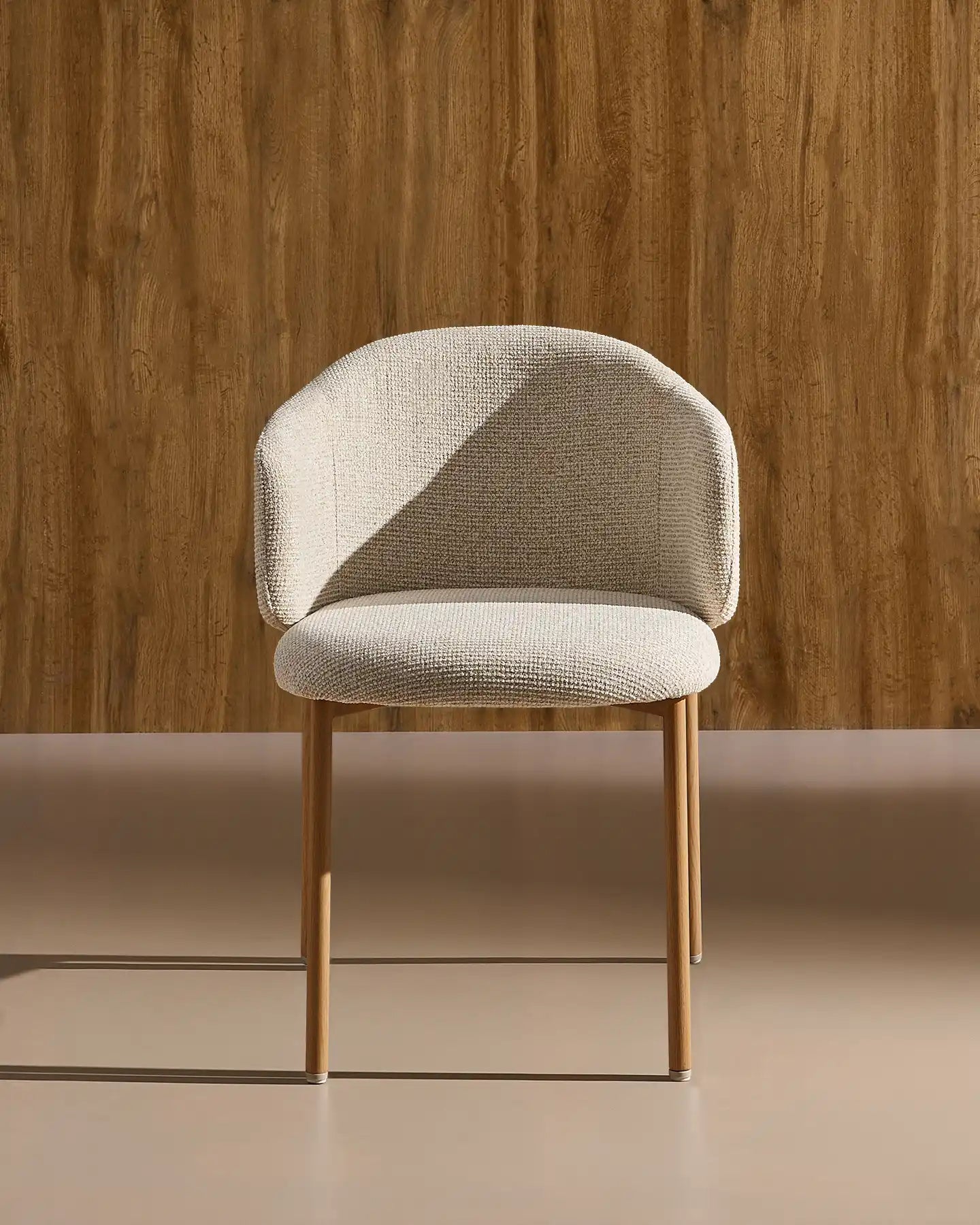 Nolan cream chenille dining chairs in a modern dining space