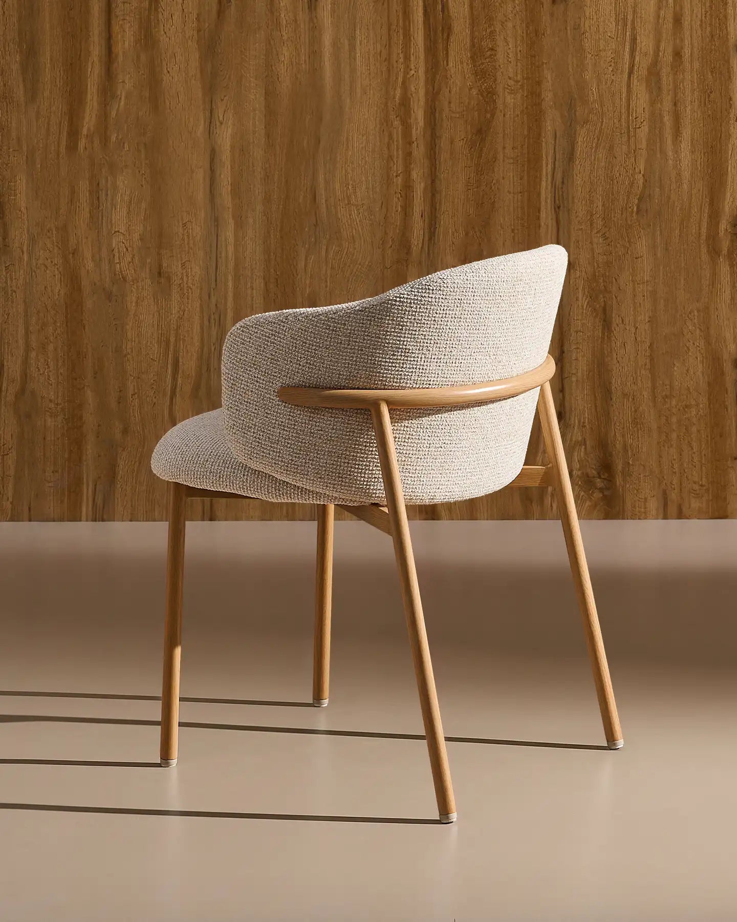 Side view of Nolan cream chenille dining chairs