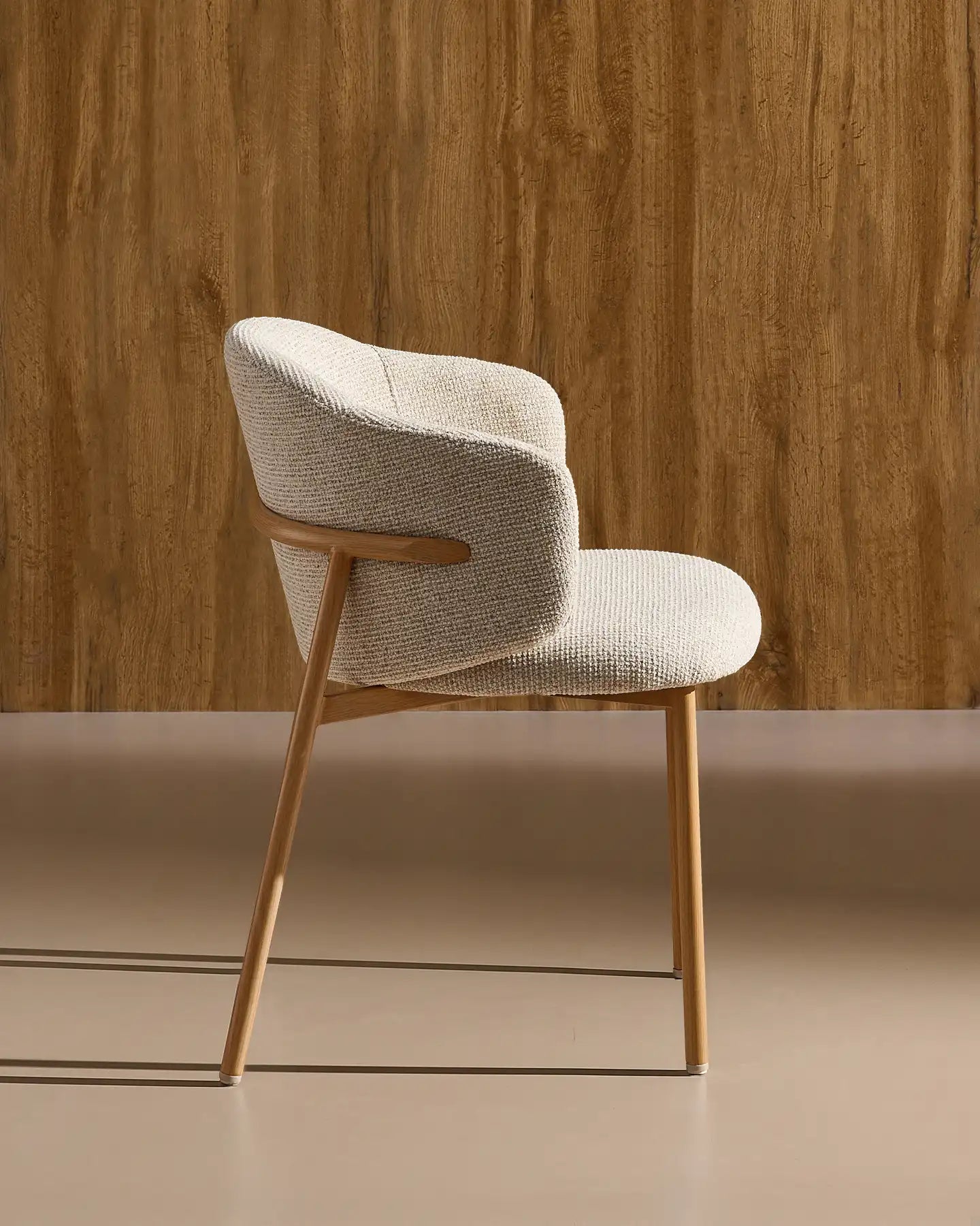Side view of Nolan cream chenille dining chairs