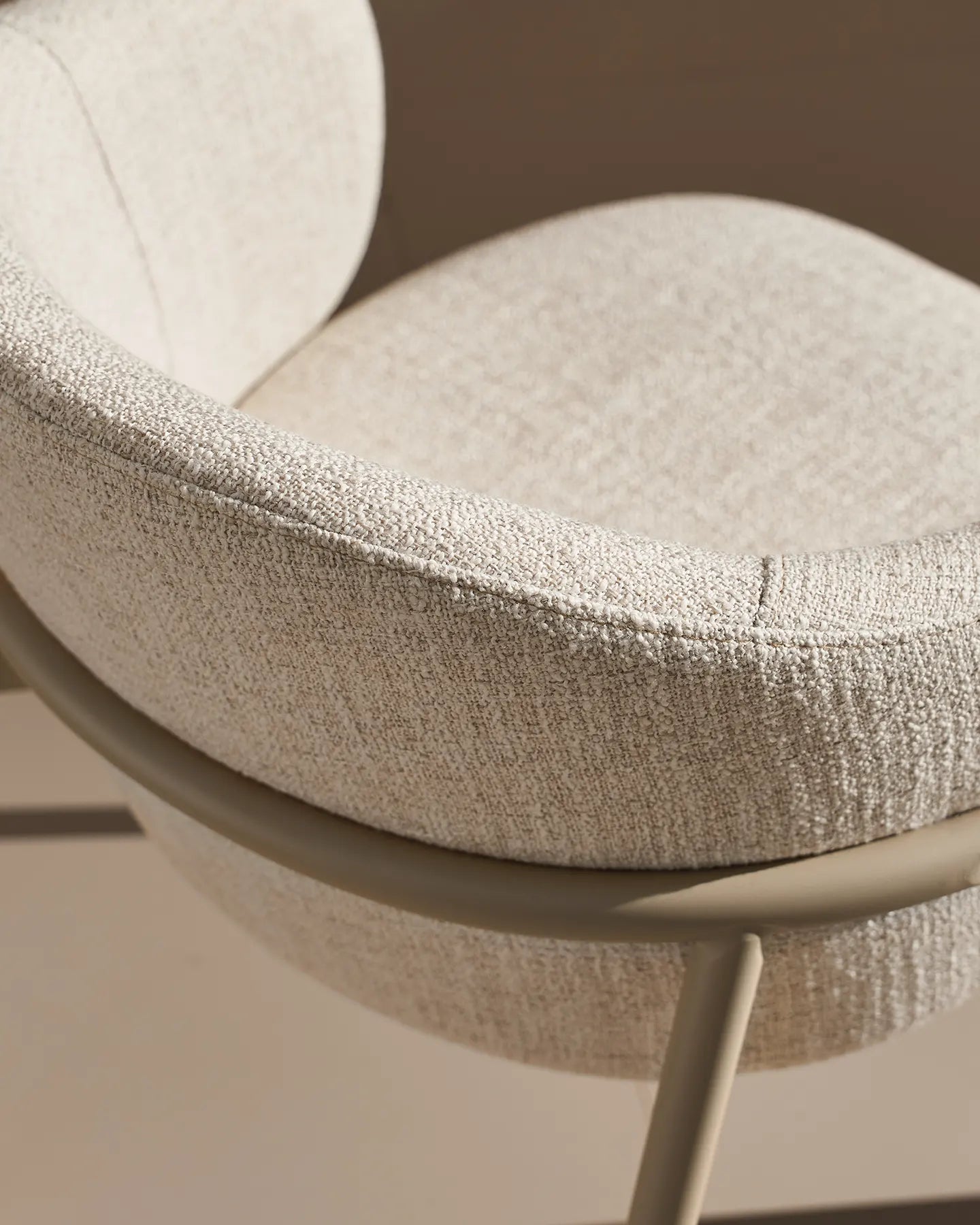 Close-up of ivory linen blend upholstery on Nolan dining chairs