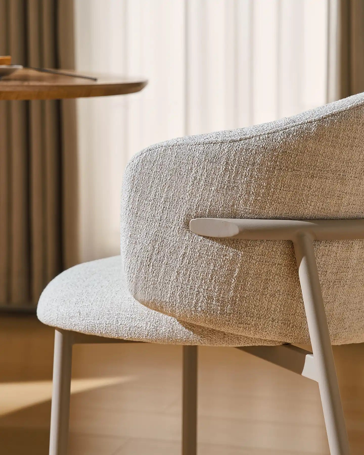 Side view of Nolan ivory linen blend dining chairs