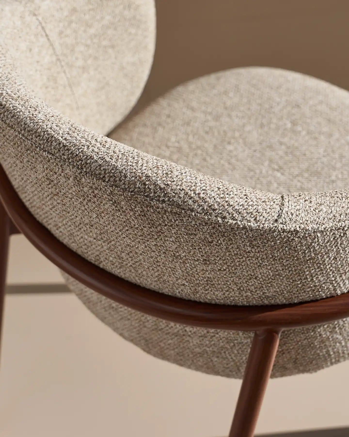 Close-up of taupe chenille upholstery on Nolan dining chairs
