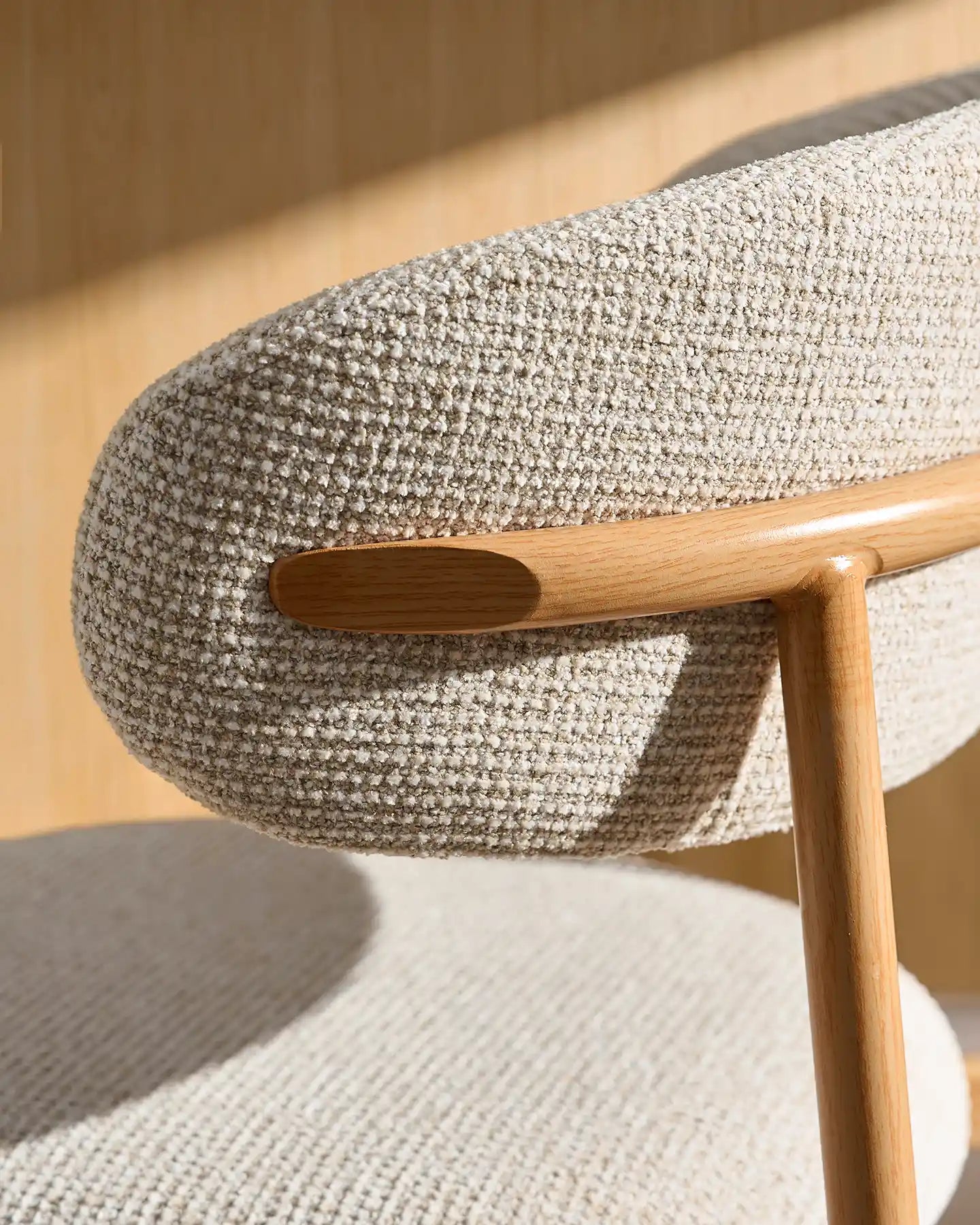 Close-up of cream chenille upholstery on Rowan bar stools