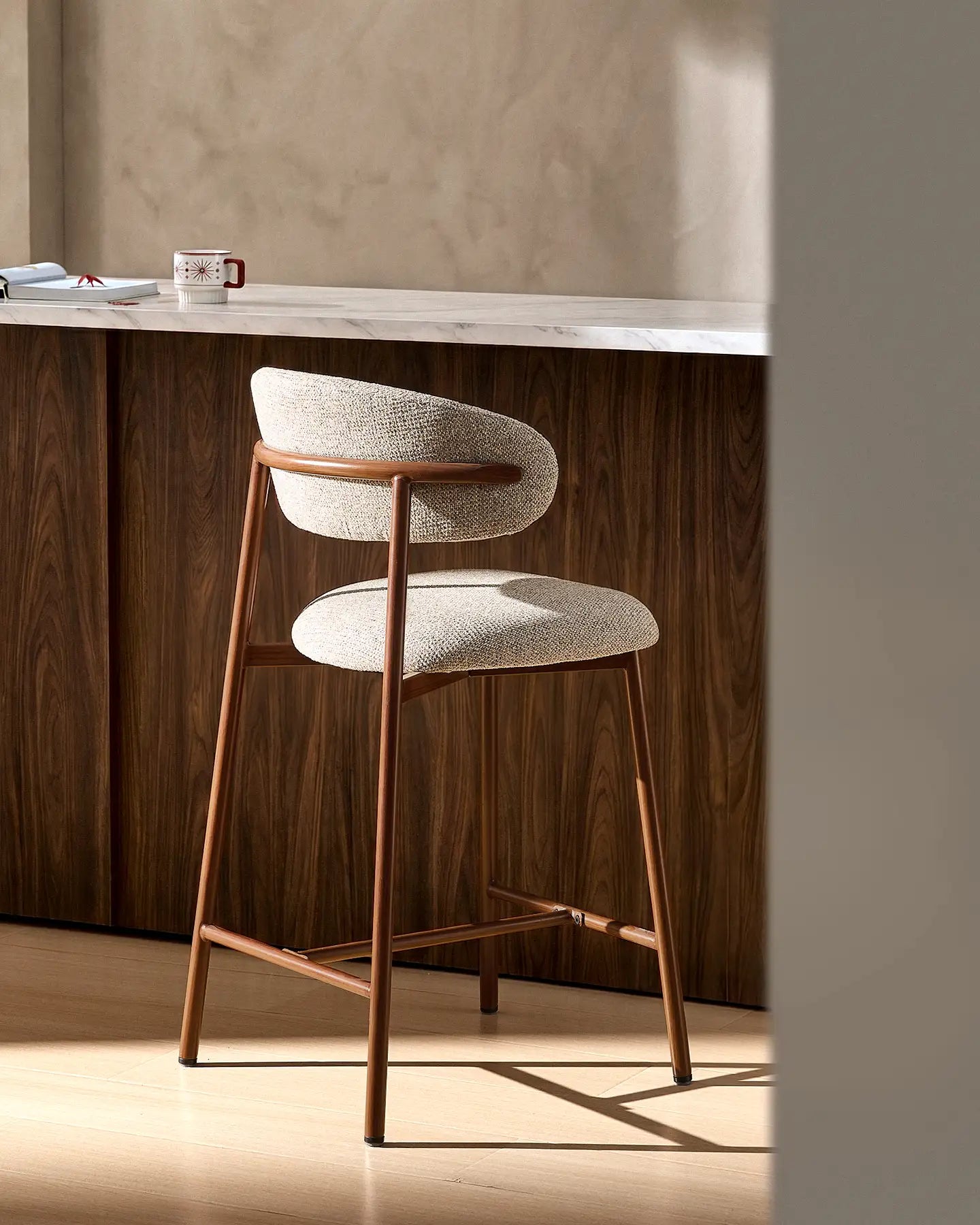 Rowan taupe chenille bar stools in a modern kitchen and dining space