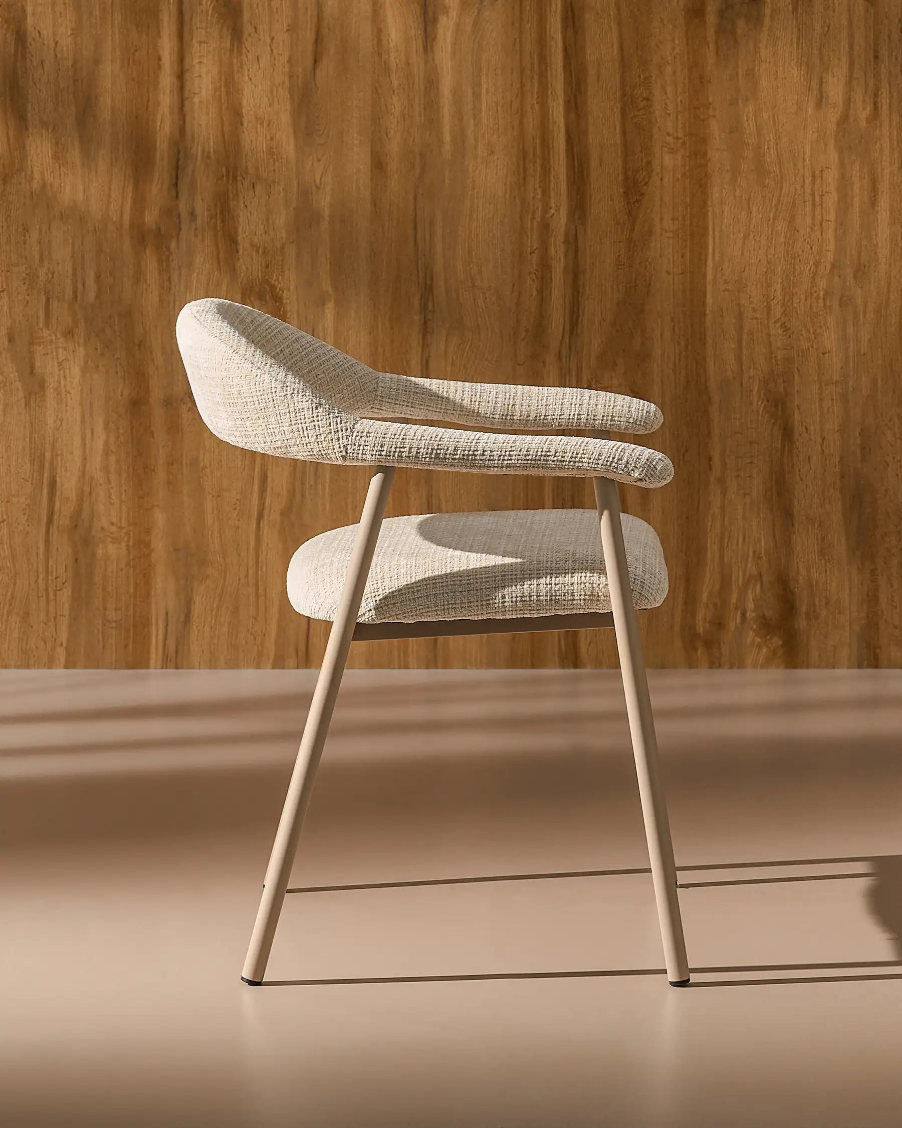 Side view of Arlo Beige chenille dining chairs with taupe legs