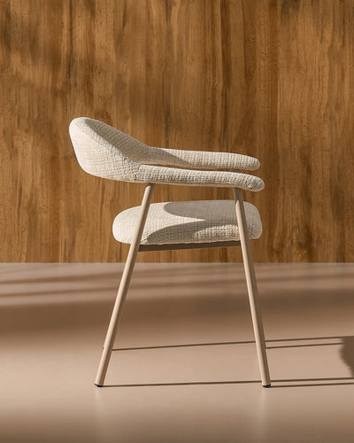 Side view of Arlo Beige chenille dining chairs with taupe legs