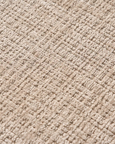 Close-up of chenille upholstery and oak-effect legs on Arlo dining chairs