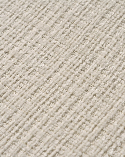Close-up of chenille upholstery and taupe legs on Arlo White dining chairs -2