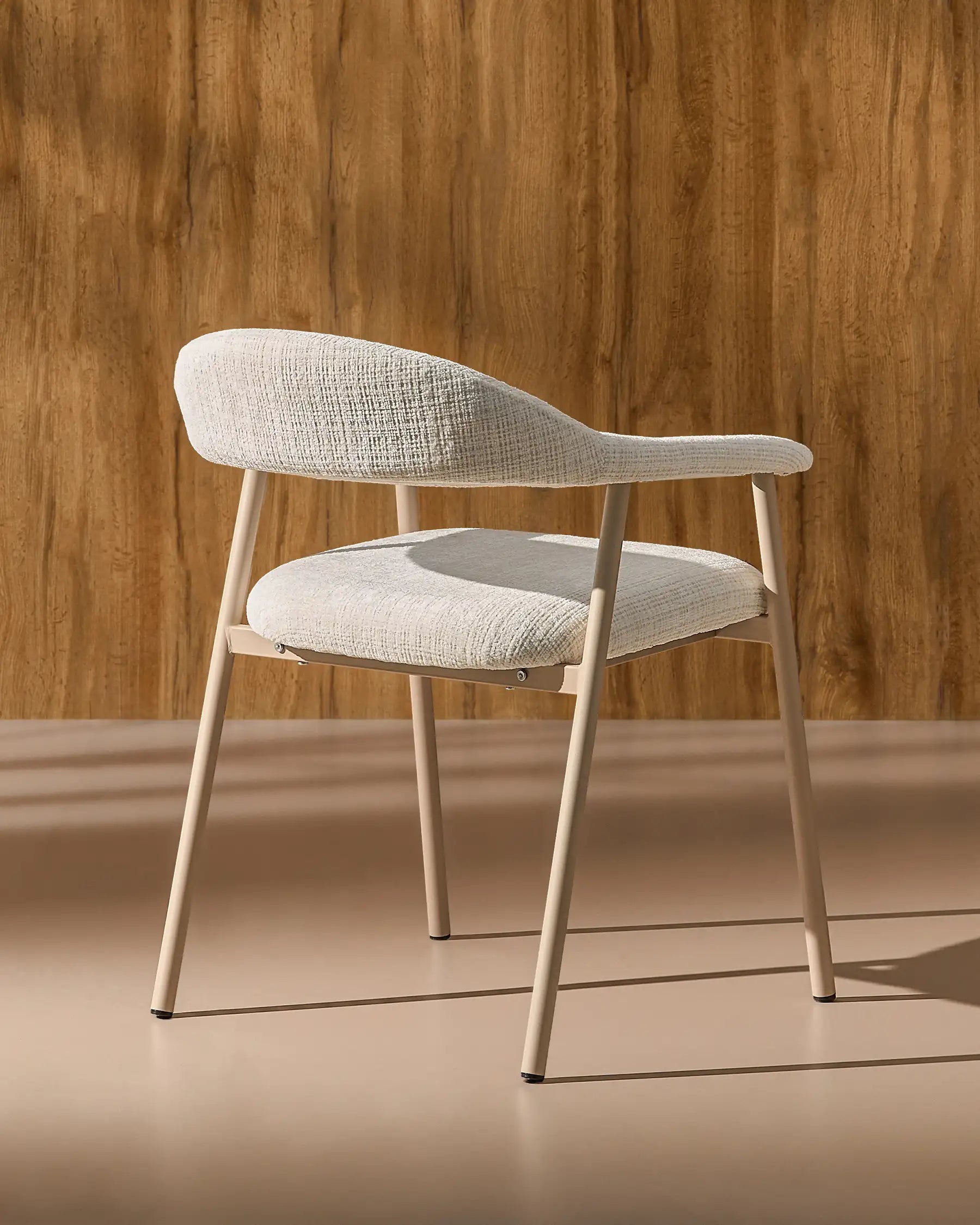 Side view of Arlo White chenille dining chairs with taupe legs