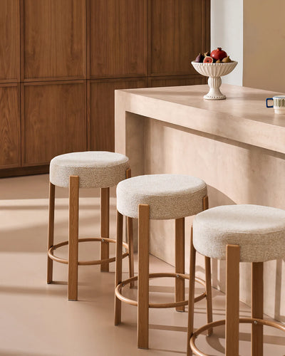 Bramley beige chenille bar stools styled around a modern kitchen island