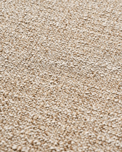 Close-up of beige linen blend upholstery on Bramley dining chairs