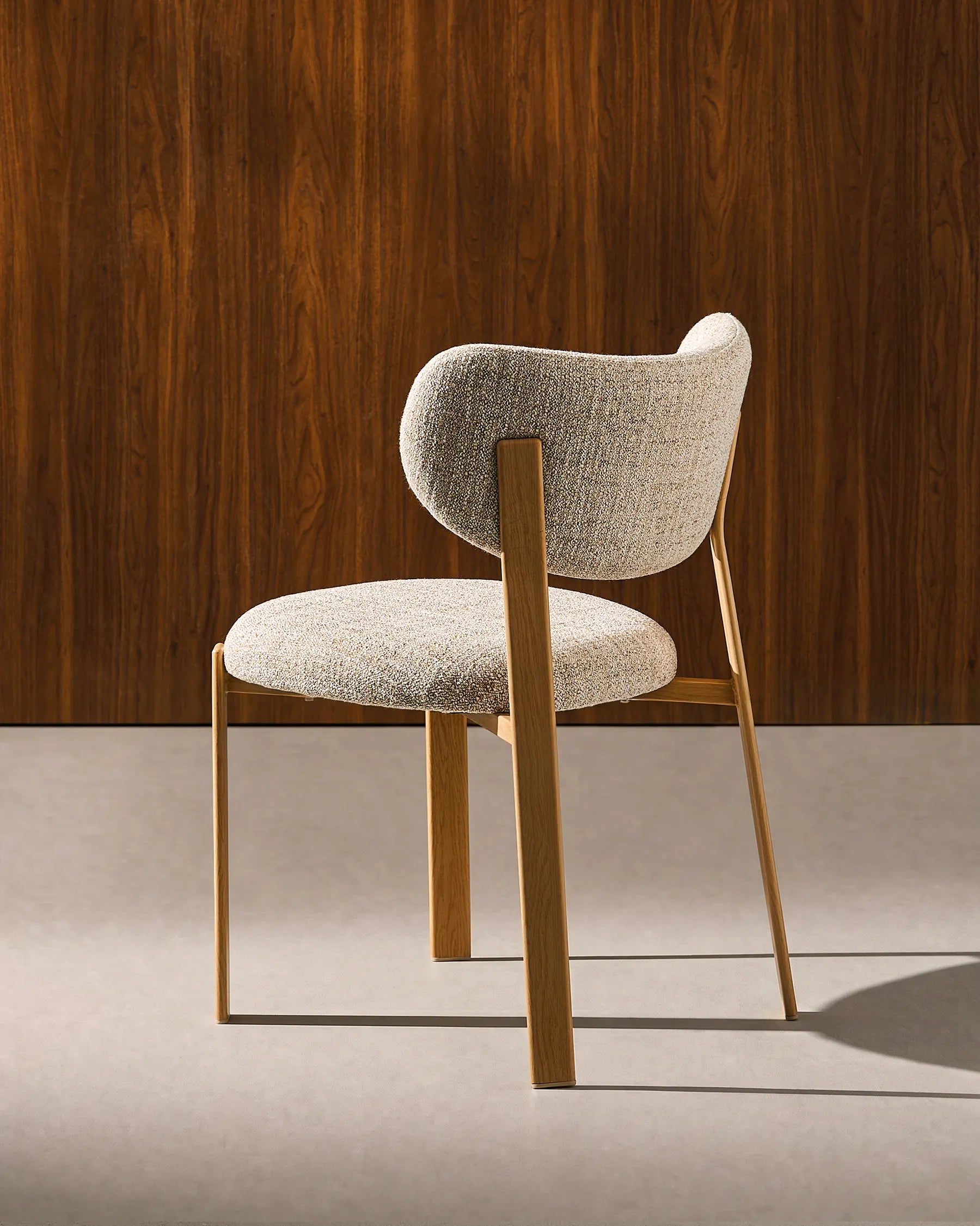 Side view of Bramley beige linen blend dining chairs