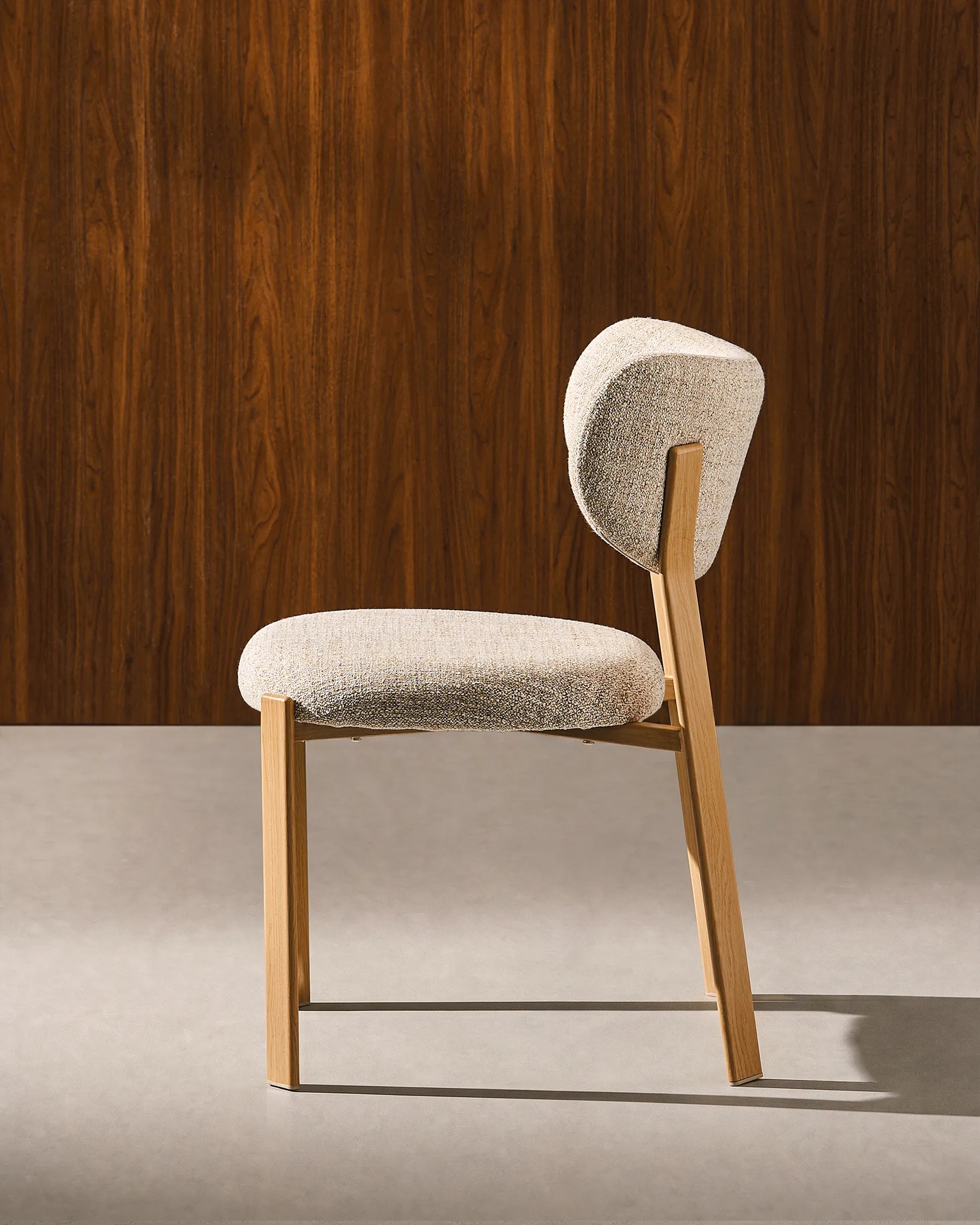 Side view of Bramley beige linen blend dining chairs