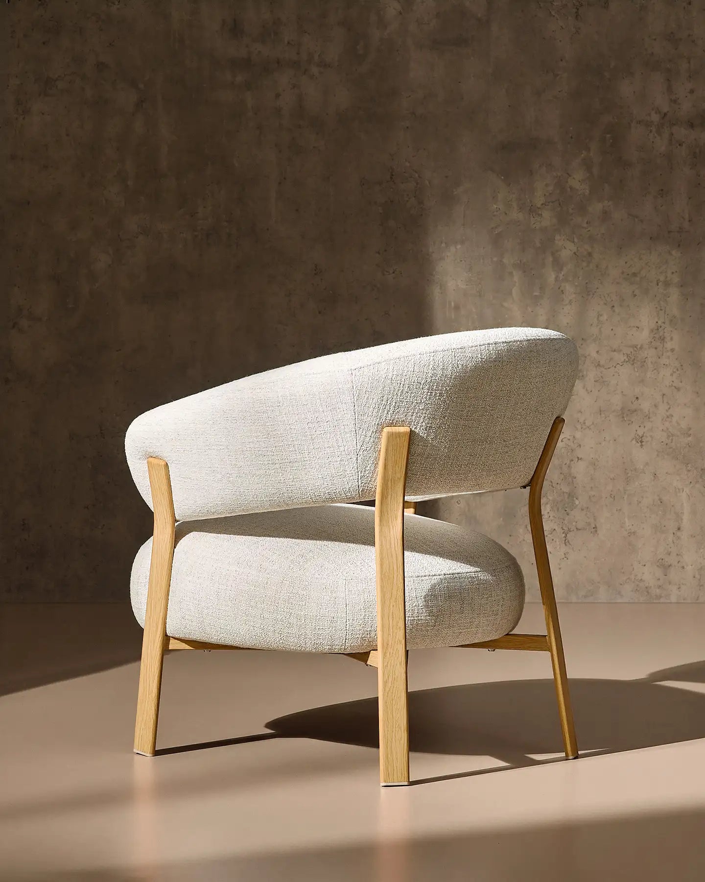 Side view of Bramley cream linen blend accent chair