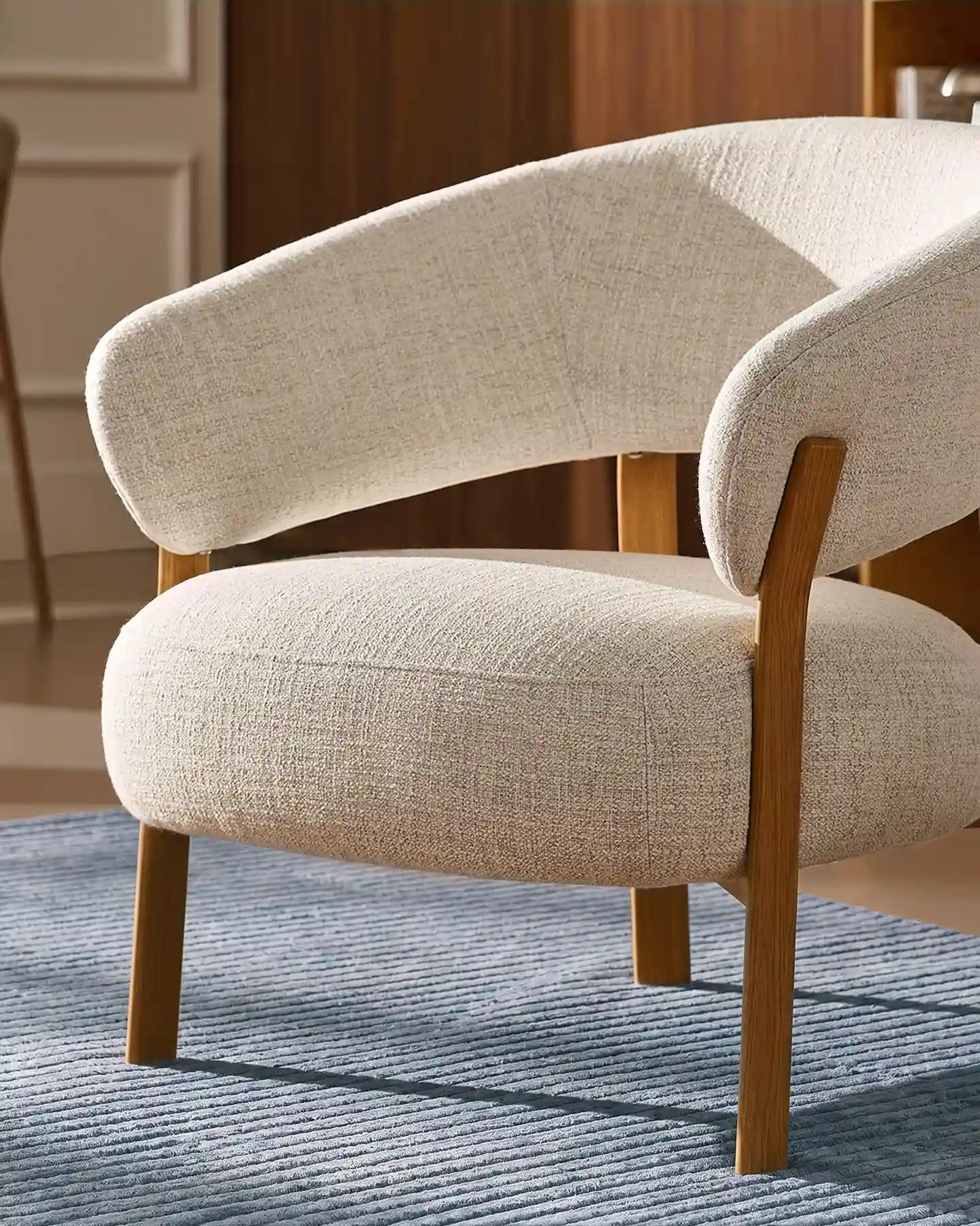 Side view of Bramley cream linen blend accent chair