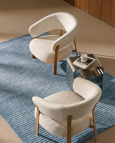 Bramley cream linen blend accent chair in a modern living space