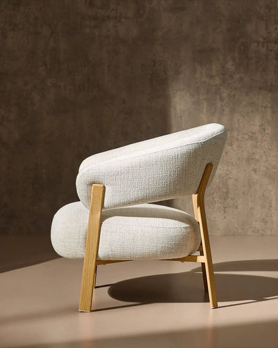 Side view of Bramley cream linen blend accent chair