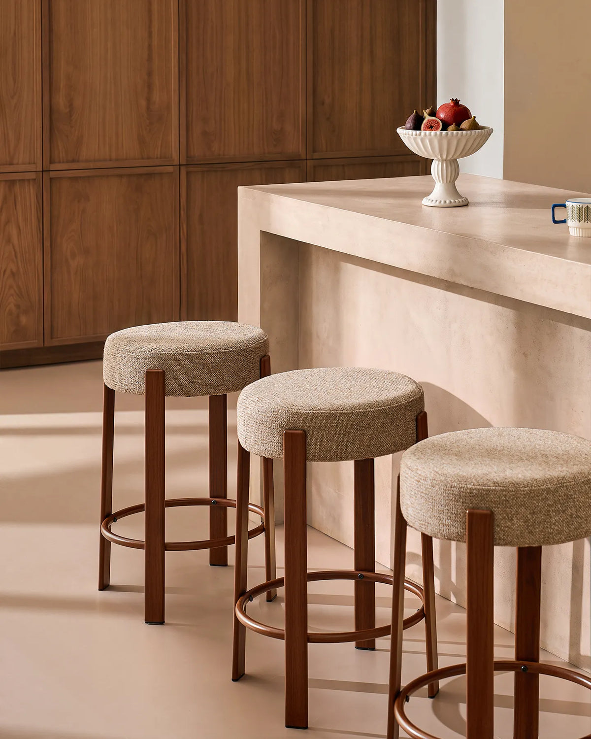 Bramley light taupe chenille bar stools styled around a modern kitchen island