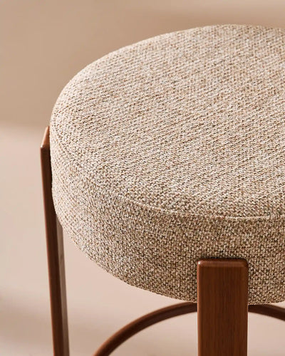 Close-up of the textured light taupe chenille upholstery on the Bramley bar stool