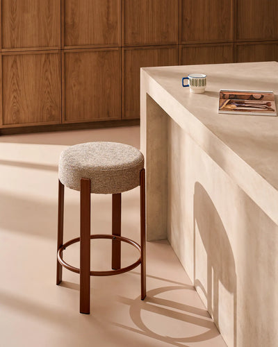 Side view of the Bramley light taupe chenille bar stool with 65 cm seat height and metal frame
