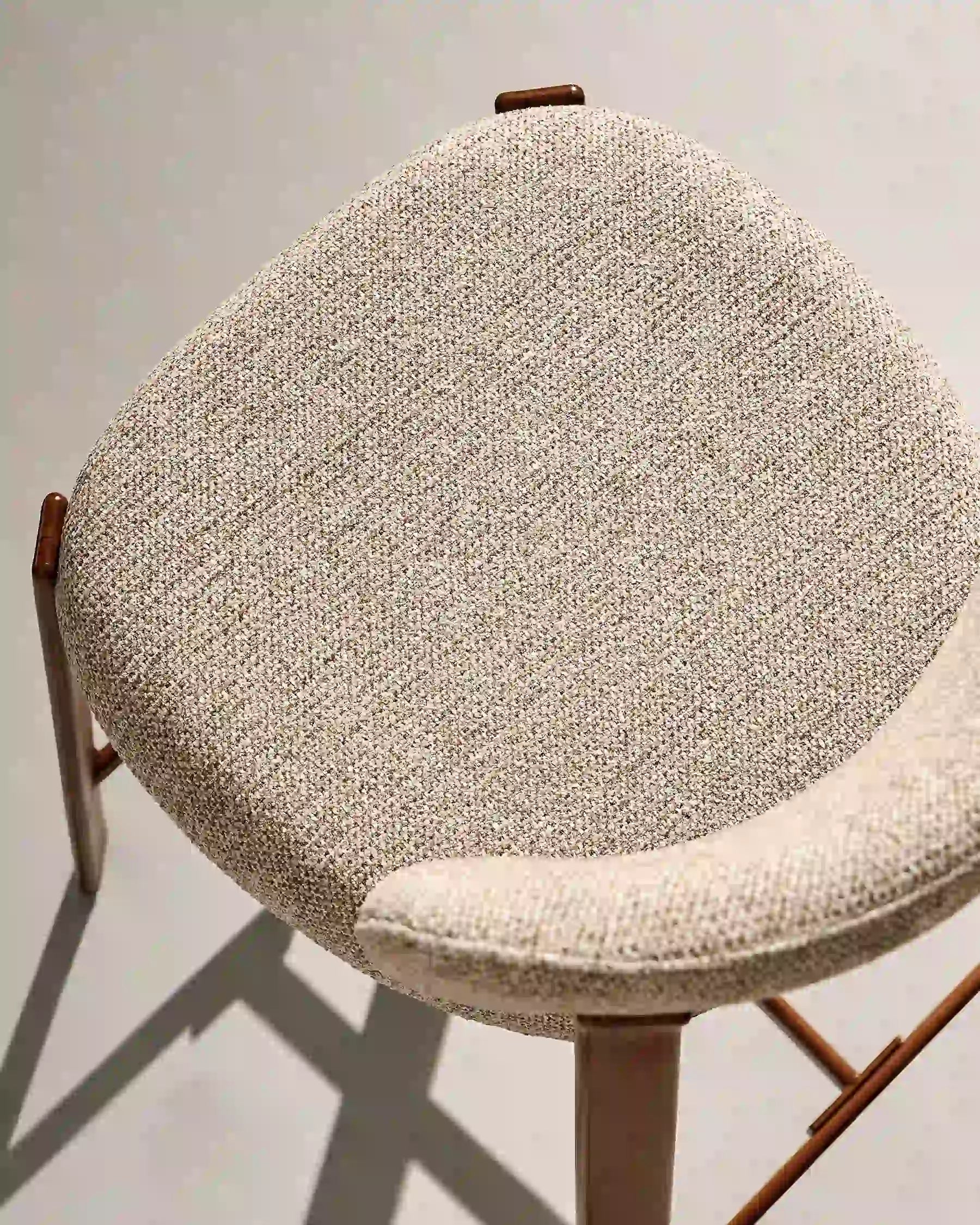 Close-up of light taupe chenille upholstery on Bramley bar stools