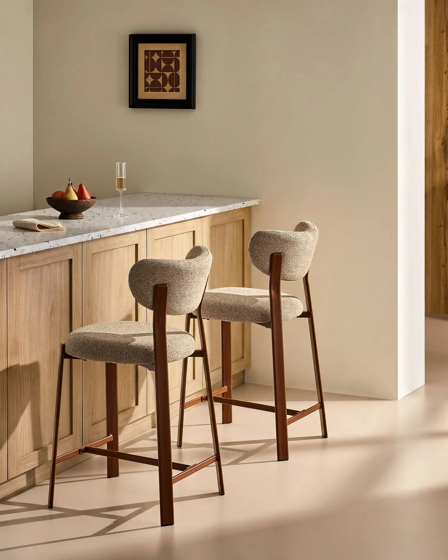 Bramley light taupe chenille bar stools in a modern dining space