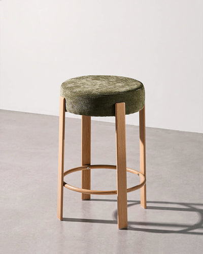Bramley olive green chenille bar stool with a round upholstered seat and integrated footrest