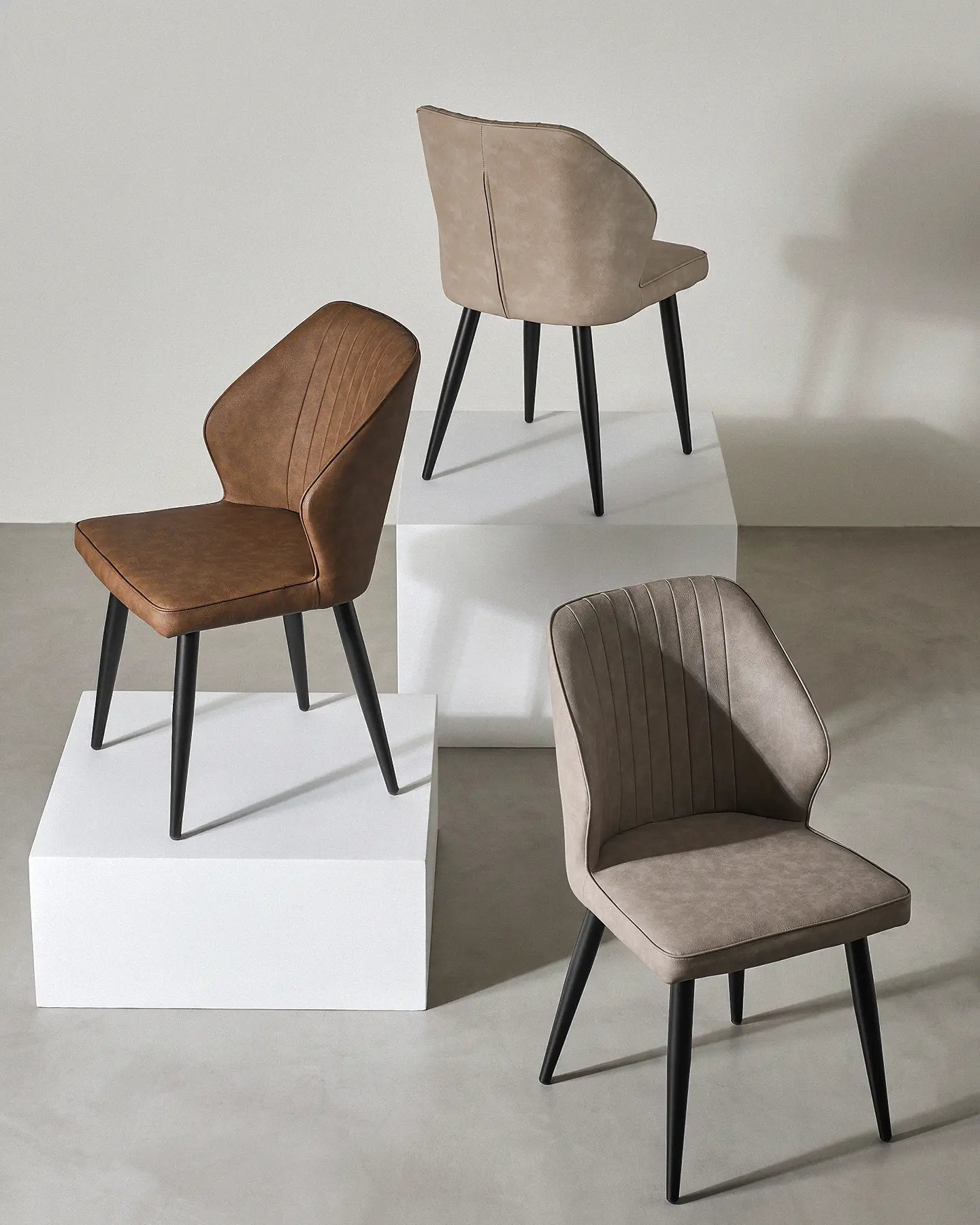 Danforth Beige Faux Leather Dining Chairs Around a Modern Dining Table
