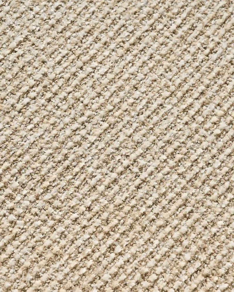 Close-up of beige chenille upholstery on Elowen dining chairs