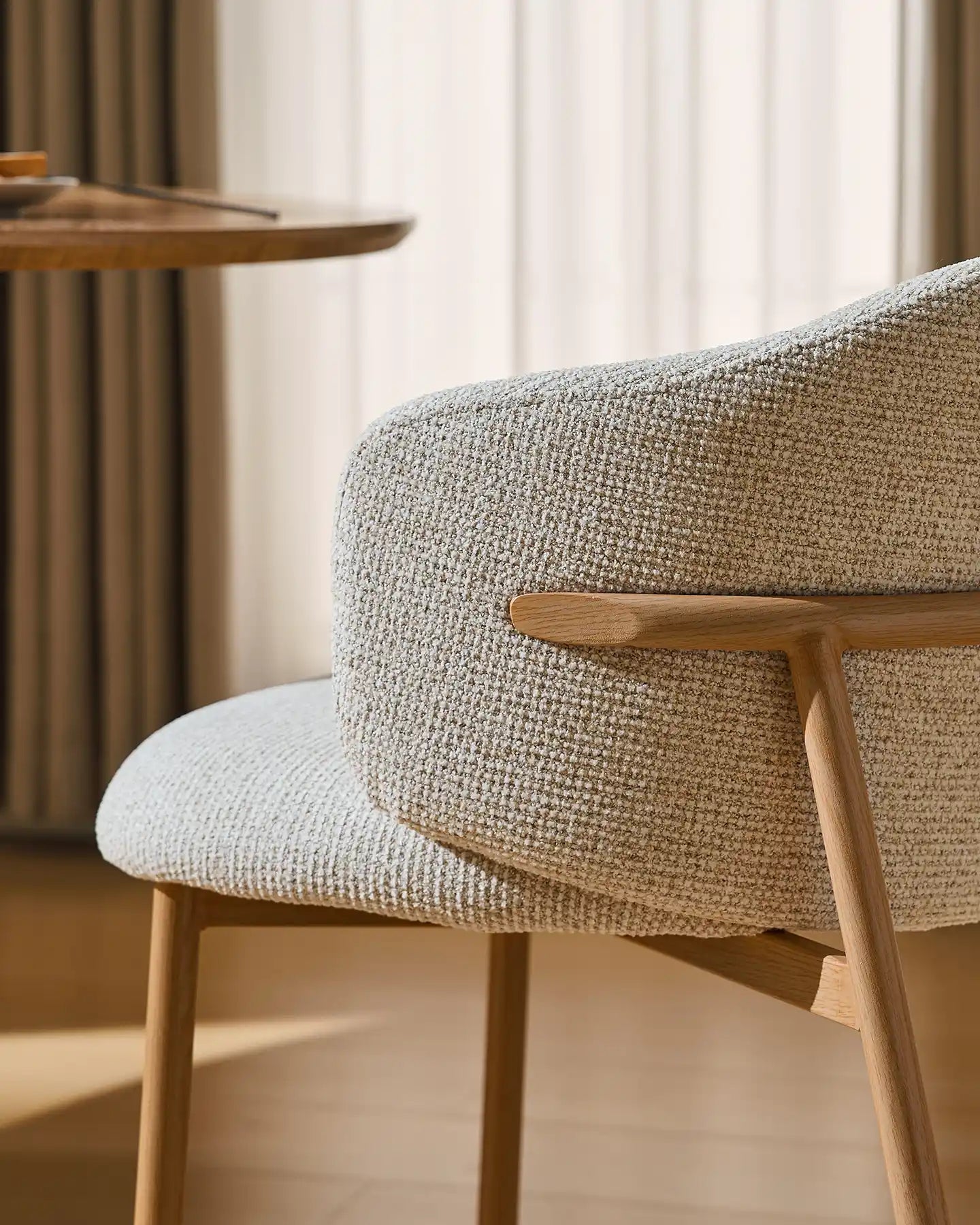 Side view of Nolan cream chenille dining chairs
