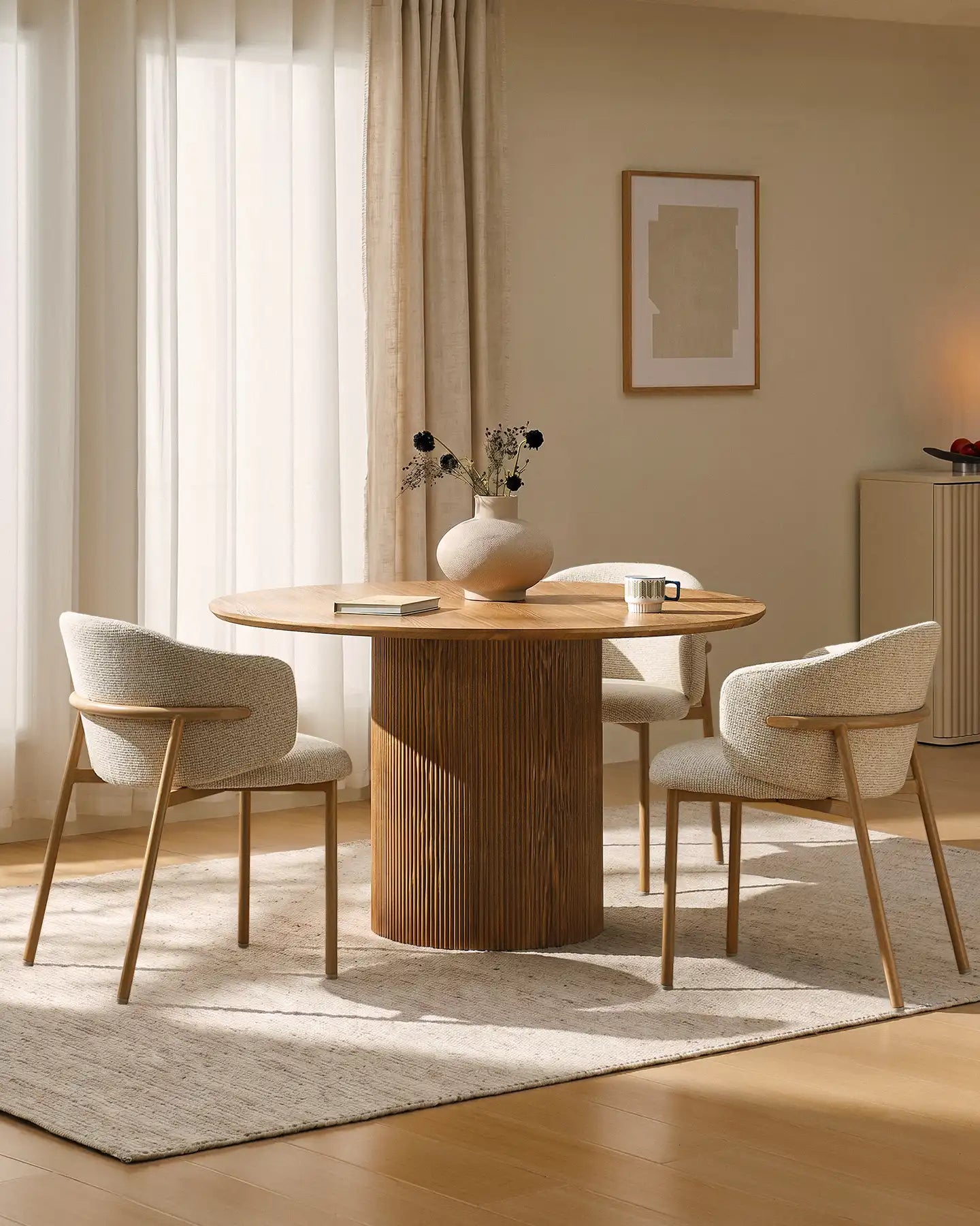 Nolan cream chenille dining chairs in a modern dining space