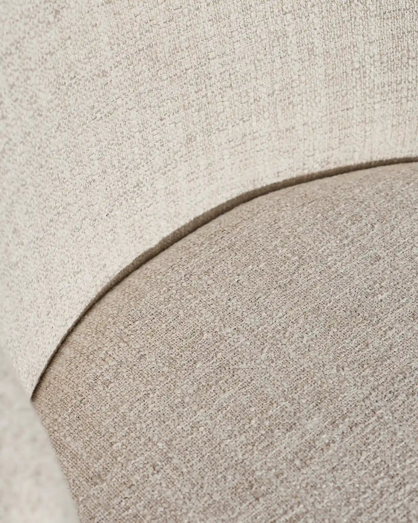 Close-up of ivory linen blend upholstery on Nolan dining chairs