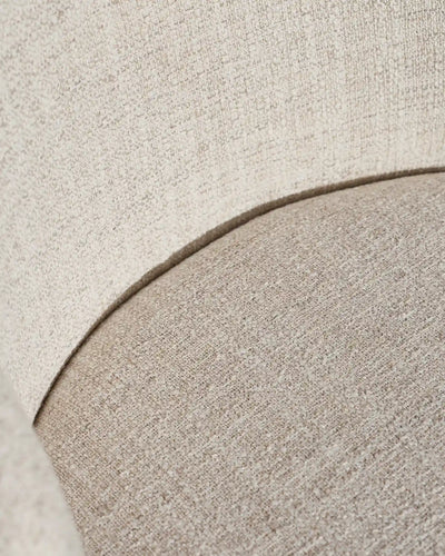 Close-up of ivory linen blend upholstery on Nolan dining chairs
