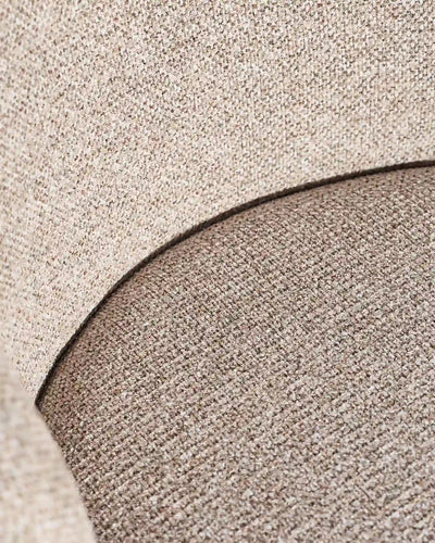 Close-up of taupe chenille upholstery on Nolan dining chairs