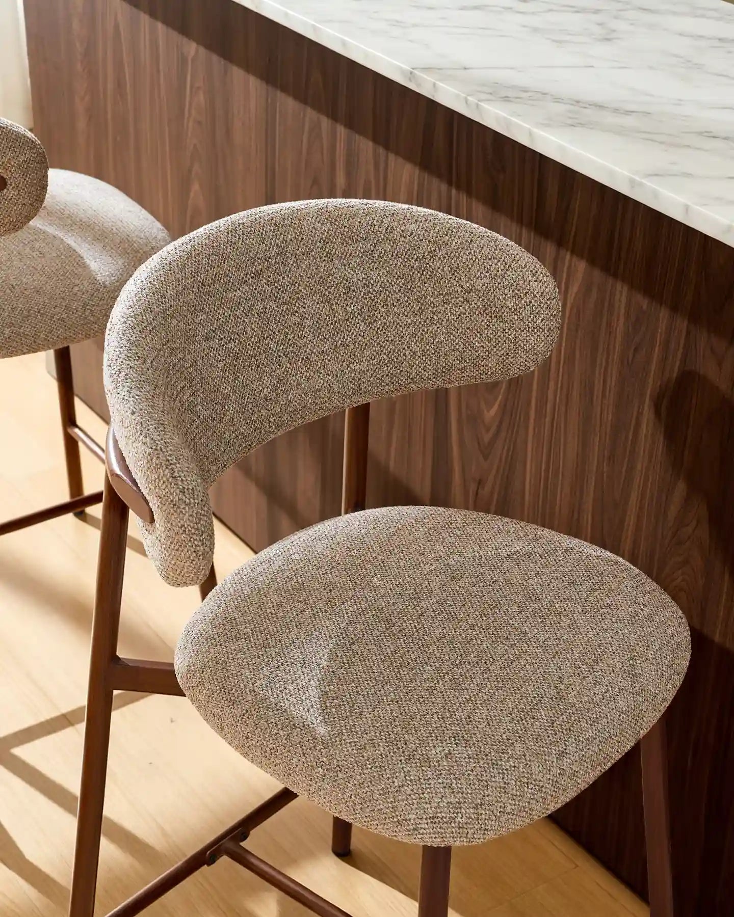 Close-up of taupe chenille upholstery on Rowan bar stools
